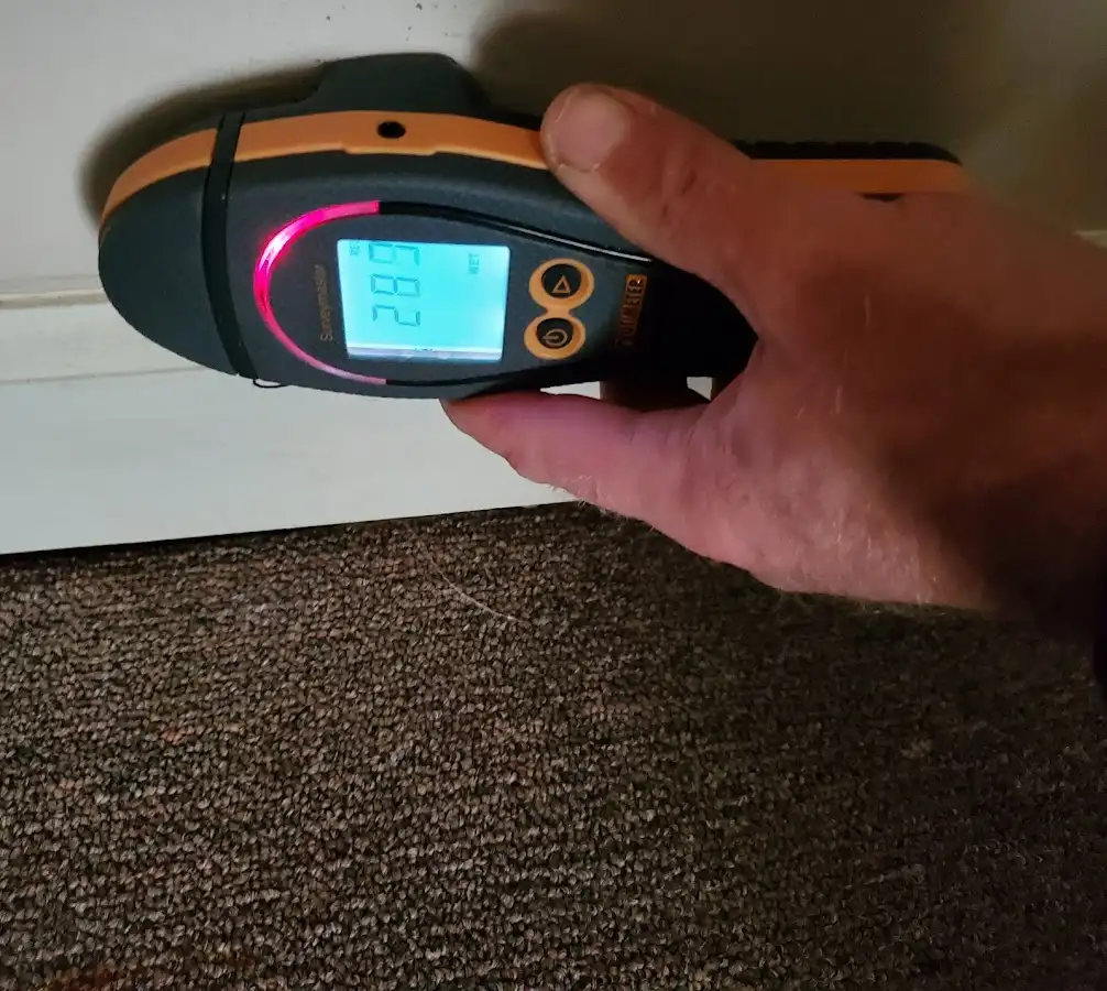 Moisture detection at baseboard during Burst Pipe Cleanup in Ladson